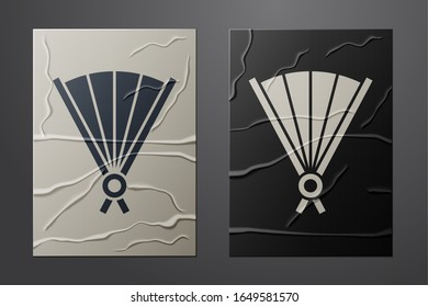 White Traditional paper chinese or japanese folding fan icon isolated on crumpled paper background. Paper art style. Vector Illustration