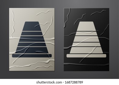White Traffic cone icon isolated on crumpled paper background. Paper art style. Vector Illustration