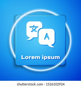 White Translator icon isolated on blue background. Foreign language conversation icons in chat speech bubble. Translating concept. Blue square button. Vector Illustration