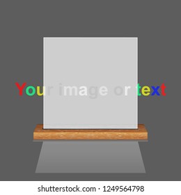White translucent frame on a wooden shelf. Isolated object on a dark background.