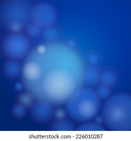 White transparent bubbles on a blue background. 