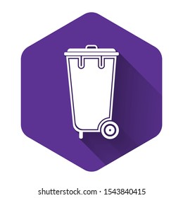 White Trash can icon isolated with long shadow. Garbage bin sign. Recycle basket icon. Office trash icon. Purple hexagon button. Vector Illustration