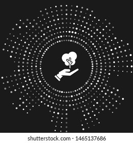 White Tree in hand of environmental protection icon isolated on grey background. Seed and seedling. Planting sapling. Ecology concept. Abstract circle random dots. Vector Illustration
