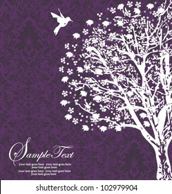 white tree silhouette on purple background