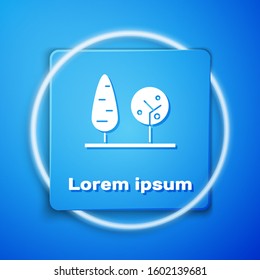 White Trees icon isolated on blue background. Forest symbol. Blue square button. Vector Illustration