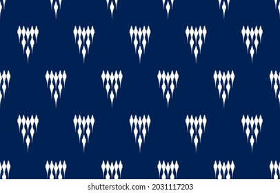 white triangle ikat ethnic blue design background. Seamless geometric ikat pattern in tribal, folk embroidery abstract art. ornament print. Design for carpet, clothing, wrapping, fabric, fashion.