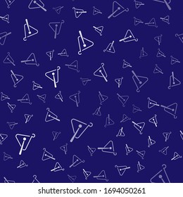 White Triangle musical instrument icon isolated seamless pattern on blue background.  Vector Illustration