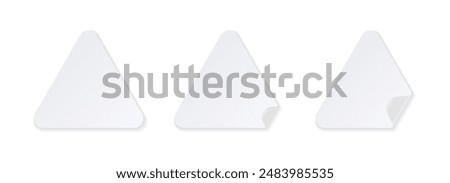 White triangle stickers with folded corner.