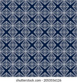 White Tribal or Native Seamless Pattern on Blue Background in Symmetry Rhombus Geometric Bohemian Style for Clothing or Apparel,Embroidery,Fabric,Package Design
