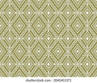 Tribu blanca o patrón étnico sin foco sobre fondo verde en simetría Rhombus estilo bohemio geométrico para ropa o ropa, bordado,tela,diseño de paquete