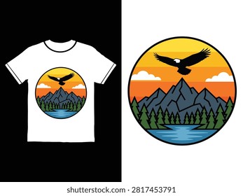 White tshirt featuring circular graphic of eagle flying above mountain range sunset scene