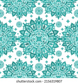 Weiße und türkisfarbene Muster mit Mandala-Ornament. Traditionelle arabische, indische Motive. Ideal für Gewebe und Textilien, Tapeten, Verpackungen oder jede erwünschte Idee.