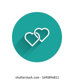 White Two Linked Hearts icon isolated with long shadow. Romantic symbol linked, join, passion and wedding. Happy Women Day. Green circle button. Vector Illustration