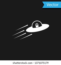 White UFO flying spaceship and alien icon isolated on black background.  