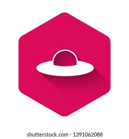 White UFO flying spaceship icon isolated with long shadow. Flying saucer. Alien space ship. Futuristic unknown flying object. Pink hexagon button. Vector Illustration