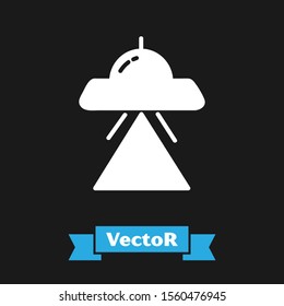 White UFO flying spaceship icon isolated on black background. Flying saucer. Alien space ship. Futuristic unknown flying object.  Vector Illustration