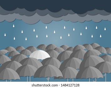 
White umbrella amidst a black umbrella On the day the storm entered paper cut ,
The difference is unique.