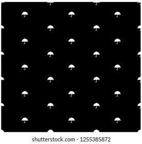 White umbrella on black background. Black and white seamless pattern