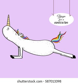 The white unicorn with rainbow mane engaged in yoga