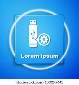 White USB flash drive and gear icon isolated on blue background. Adjusting app, service concept, setting options, maintenance, repair, fixing. Blue square button. Vector Illustration