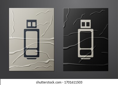White USB flash drive icon isolated on crumpled paper background. Paper art style. Vector Illustration