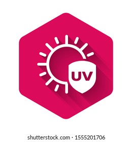 White UV protection icon isolated with long shadow. Sun and shield. Ultra violet rays radiation. SPF sun sign. Pink hexagon button. Vector Illustration