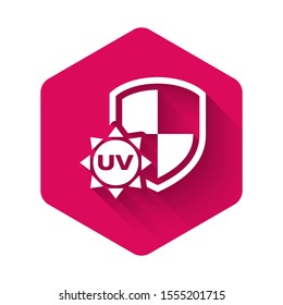White UV protection icon isolated with long shadow. Sun and shield. Ultra violet rays radiation. SPF sun sign. Pink hexagon button. Vector Illustration