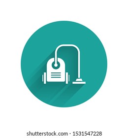White Vacuum cleaner icon isolated with long shadow. Green circle button. Vector Illustration