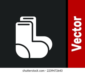 White Valenki icon isolated on black background. National Russian winter footwear. Traditional warm boots in Russia.  Vector