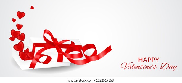 White valentine's day card with a gift and red hearts