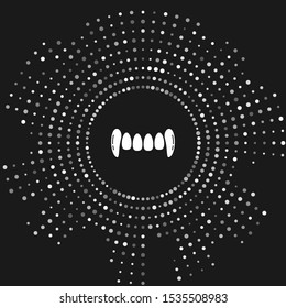 White Vampire teeth icon isolated on grey background. Happy Halloween party. Abstract circle random dots. Vector Illustration