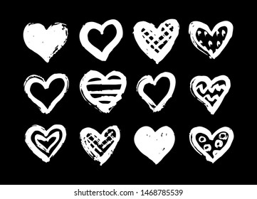 White vector hearts.Ink and paint  textures set of grungy hand drawn elements for your design isolated on black background