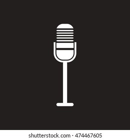 white vector icon on black background  microphone in flat style