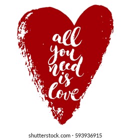 White vector lettering All you need is love on red heart. Isolated vector illustration. Handwritten modern calligraphy. Inscription for postcards, posters, prints, greeting cards, t-shirts.