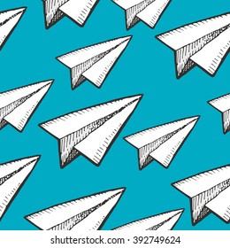 White vector paper planes on a blue background. seamless pattern