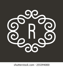 White Vector Vintage Twirl Frame for Letter Monogram on Dark grey background. Can be used as templates for labels or stickers