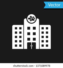 White Veterinary medicine hospital, clinic or pet shop for animals icon isolated on black background. Vet or veterinarian clinic. Vector Illustration