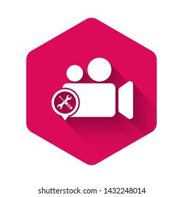 White Video camera with screwdriver and wrench icon isolated with long shadow. Adjusting, service, setting, maintenance, repair, fixing. Pink hexagon button. Vector Illustration