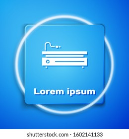 White Video game console icon isolated on blue background. Blue square button. Vector Illustration