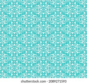 white vintage decorative pattern on turquoise background