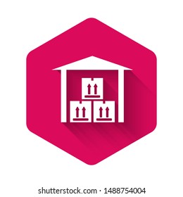 White Warehouse icon isolated with long shadow. Pink hexagon button. Vector Illustration