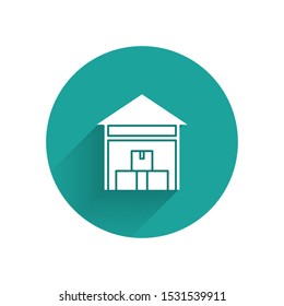 White Warehouse icon isolated with long shadow. Green circle button. Vector Illustration