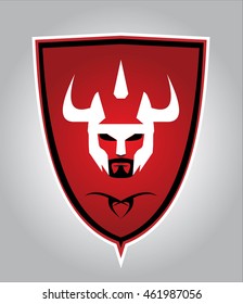 white warrior head with the mustache and beard on red shield