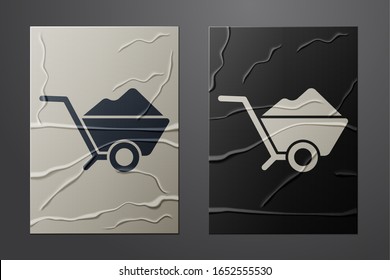White Wheelbarrow with dirt icon isolated on crumpled paper background. Tool equipment. Agriculture cart wheel farm. Paper art style. Vector Illustration