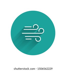 White Wind icon isolated with long shadow. Windy weather. Green circle button. Vector Illustration