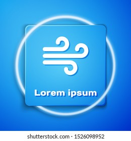 White Wind icon isolated on blue background. Windy weather. Blue square button. Vector Illustration