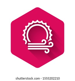 White Wind and sun icon isolated with long shadow. Windy weather. Pink hexagon button. Vector Illustration