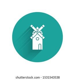 White Windmill icon isolated with long shadow. Green circle button. Vector Illustration