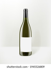 White wine in a green glass bottle with blank paper sticker. Mockup for design