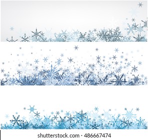 White winter banners set with blue snowflakes. Vector illustration.